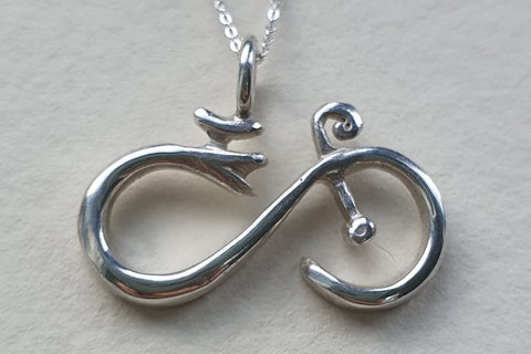 Silver cycling necklace pendant