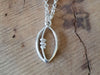 Silver Rugby Ball Pendant Necklace